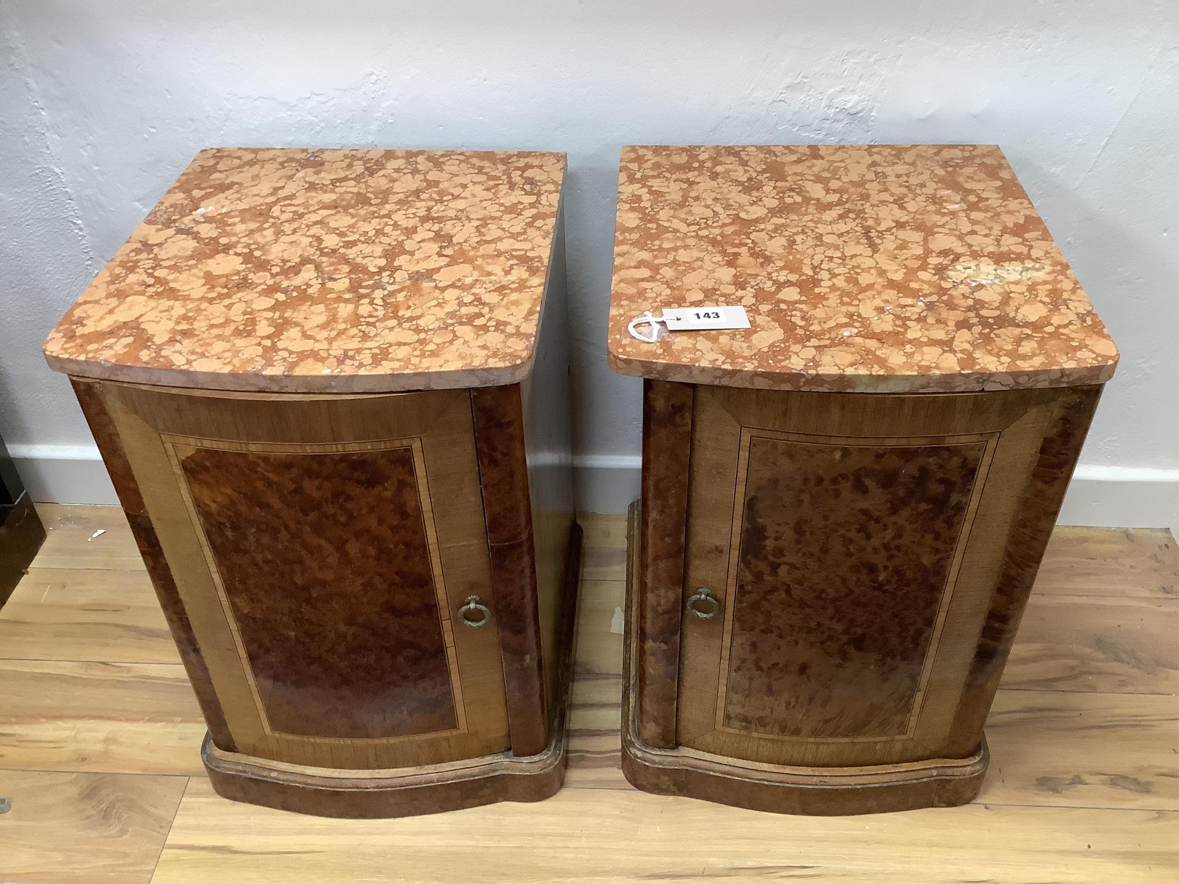 A pair of early 20th century French amboyna and mahogany marble top bedside cabinets, width 40cm, depth 43cm, height 58cm. Condition - fair